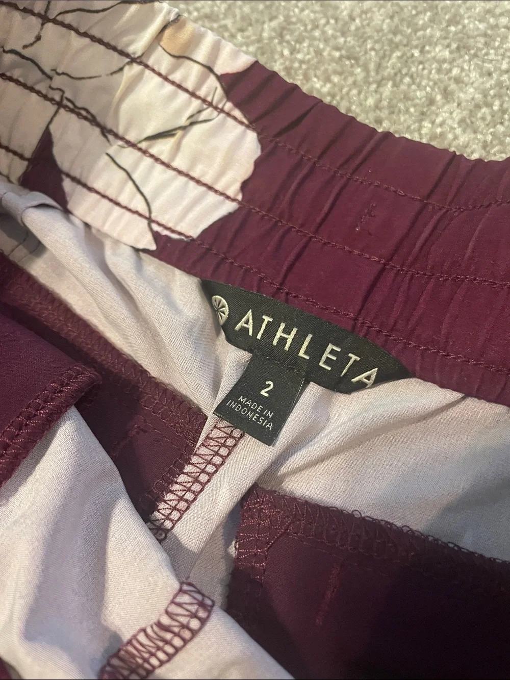 TWO pair 3” inseam Athleta Maroon Floral and Navy Speckle Shorts